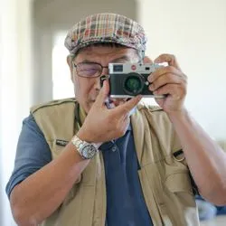 Wei Enjoys People Through Career & Photography